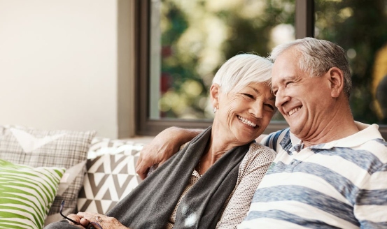 a mature couple sitting together