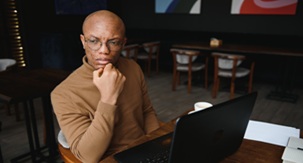 Man thinking in a chair image